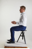  Steve Q  1 black oxford shoes blue trousers business dressed sitting white shirt whole body 0009.jpg